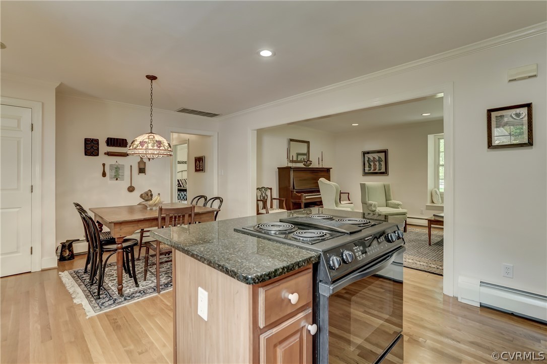1607 Genito Road Crozier, VA 23039 - Photo 9 of 49 a kitchen that has a table and chairs in it