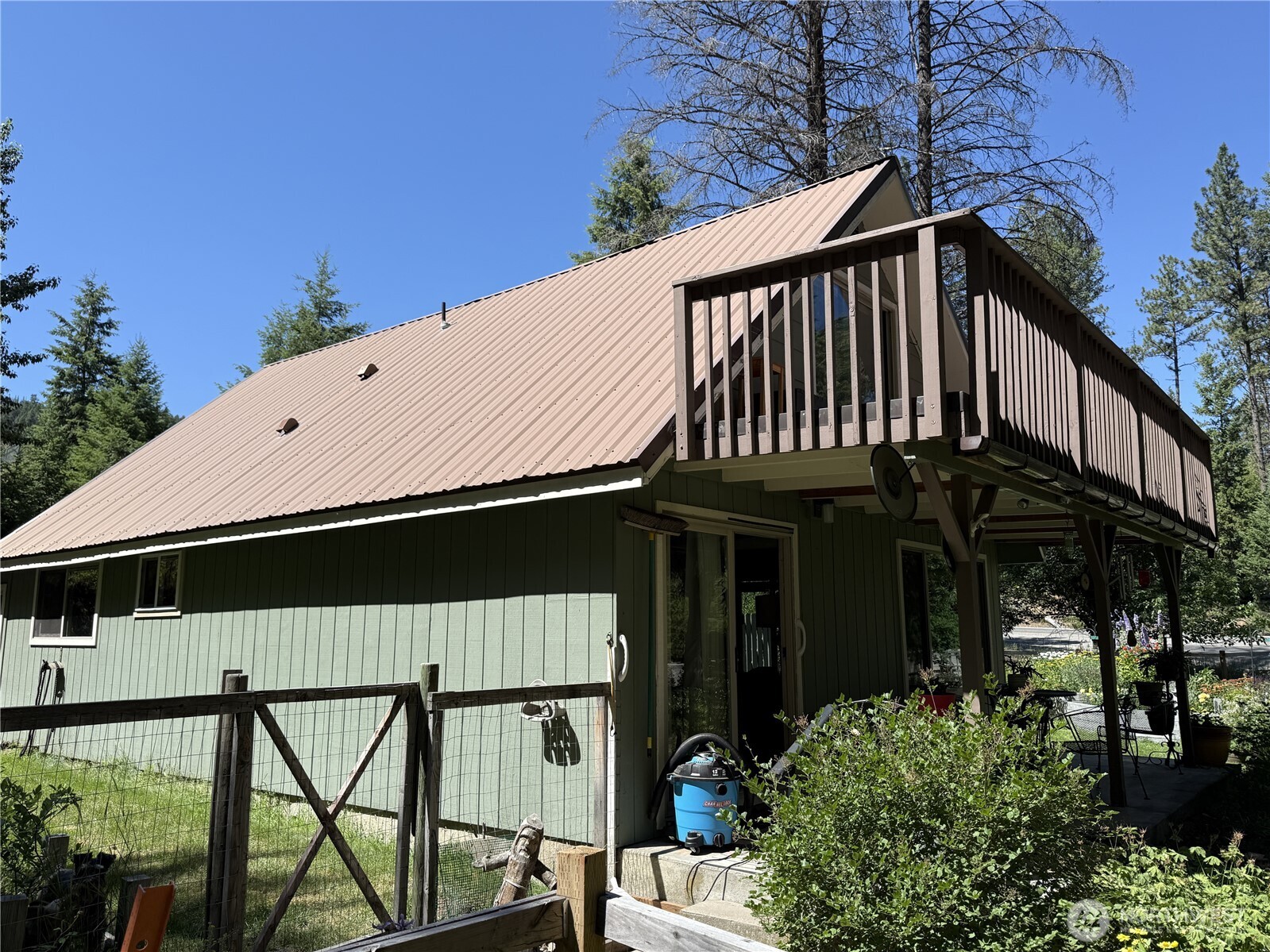 30545 State Rte 20 Republic, WA 99166 - Photo 21 of 35 a view of a house with backyard and deck
