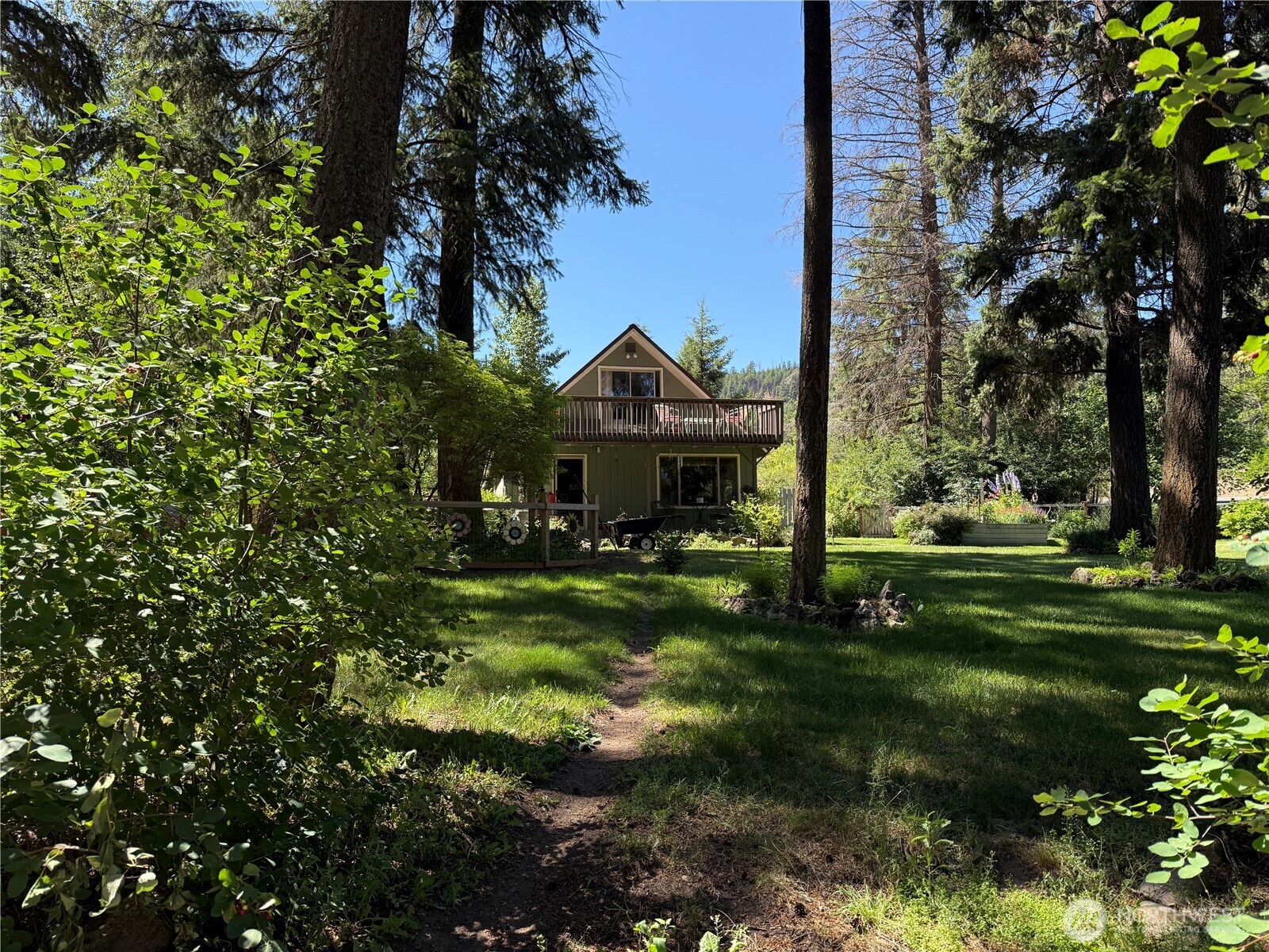 30545 State Rte 20 Republic, WA 99166 - Photo 35 of 35 a front view of a house with a garden