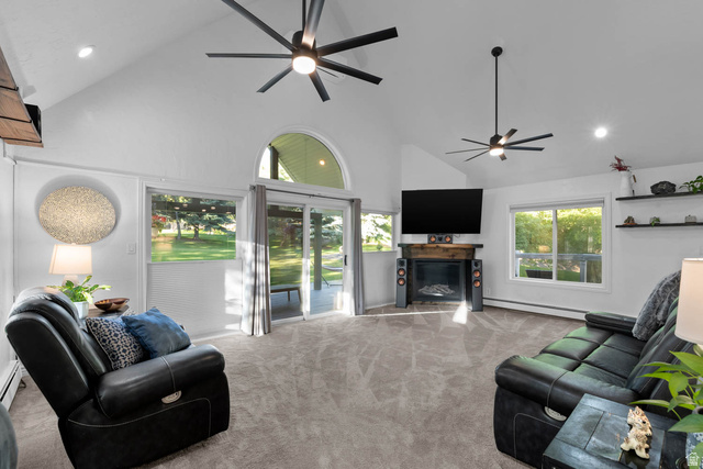 10686 South Covered Brg Cyn Road, Unit 14 Spanish Fork, UT 84660 - Photo 27 of 44 Spacious living area featuring a vaulted ceiling and recessed lighting