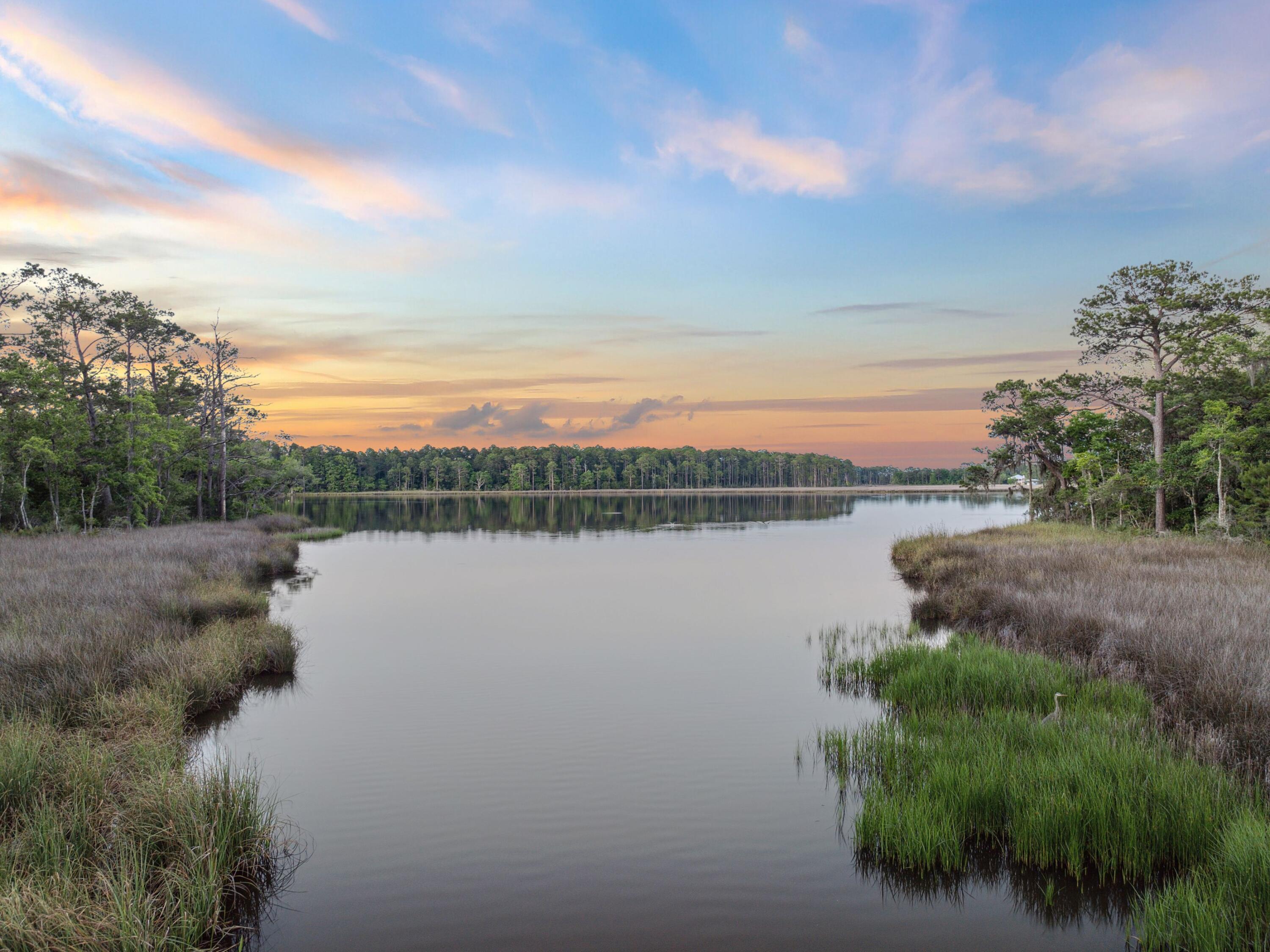 Lot 9 East Shallows Drive Santa Rosa Beach, FL 32459 - Photo 13 of 13 a view of a lake from a yard