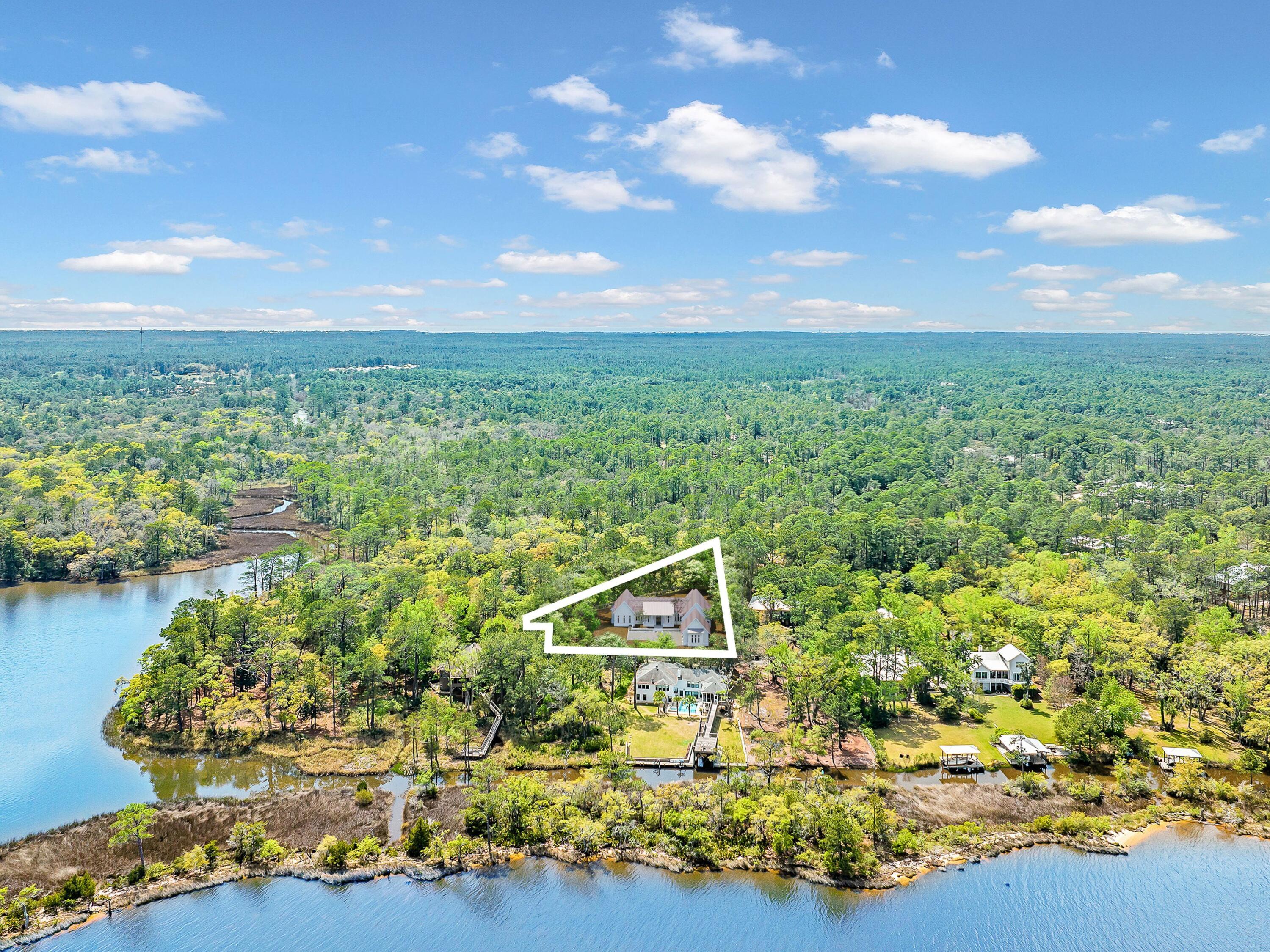 Lot 9 East Shallows Drive Santa Rosa Beach, FL 32459 - Photo 9 of 13 a view of a lake with a mountain
