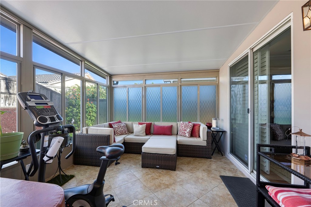 27956 Crystal Spring Drive Menifee, CA 92584 - Photo 15 of 75 a living room with furniture and large windows
