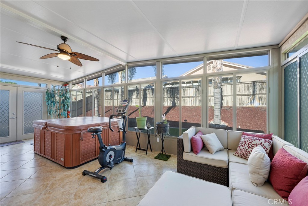 27956 Crystal Spring Drive Menifee, CA 92584 - Photo 16 of 75 a living room with furniture and a large window