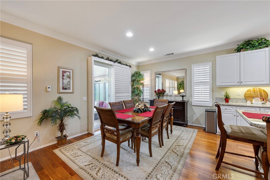 27956 Crystal Spring Drive Menifee, CA 92584 - Photo 20 of 75 a view of a dining room with furniture and window