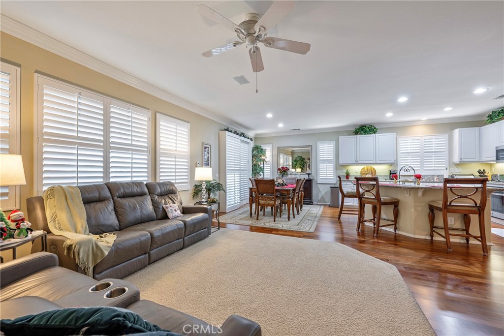27956 Crystal Spring Drive Menifee, CA 92584 - Photo 31 of 75 a living room with furniture and a large window