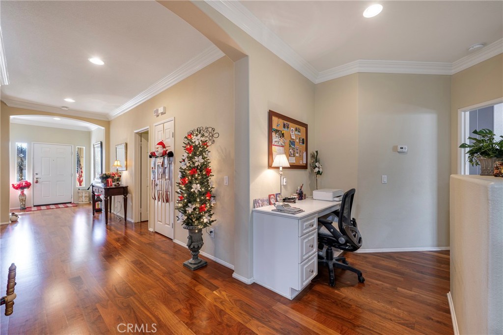 27956 Crystal Spring Drive Menifee, CA 92584 - Photo 34 of 75 a view of a livingroom with workspace and a window