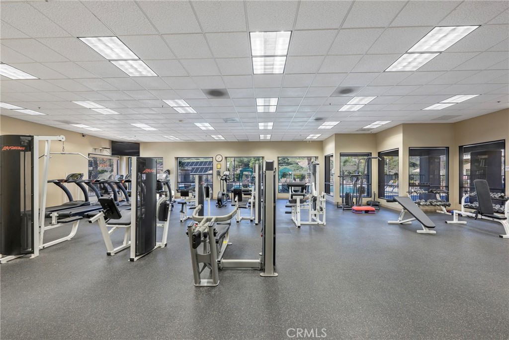 27956 Crystal Spring Drive Menifee, CA 92584 - Photo 59 of 75 a view of a room with gym equipment
