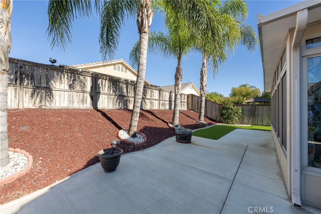 27956 Crystal Spring Drive Menifee, CA 92584 - Photo 9 of 75 a view of a house with backyard and swimming pool