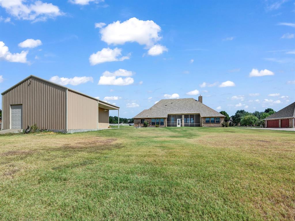 169 Pack Saddle Trail Weatherford, TX 76088 - Photo 35 of 40 a view of a backyard of the house