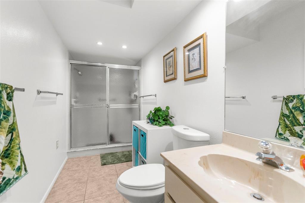 2509 Westchester Boulevard Spring Hill, FL 34606 - Photo 18 of 29 a bathroom with a sink toilet and shower