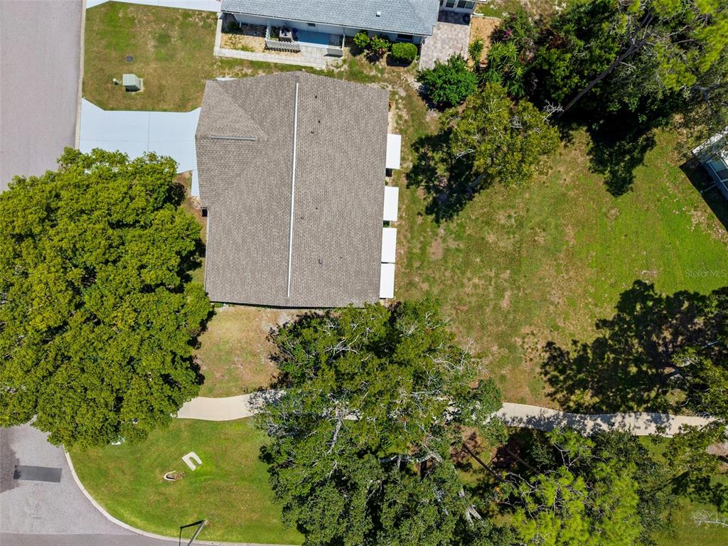 2509 Westchester Boulevard Spring Hill, FL 34606 - Photo 27 of 29 view of a house with a swimming pool