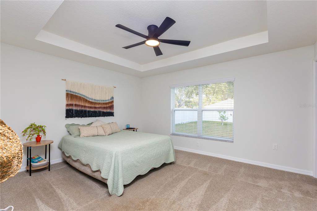 10 Rale Place Palm Coast, FL 32164 - Photo 14 of 27 a bedroom with a bed and a window
