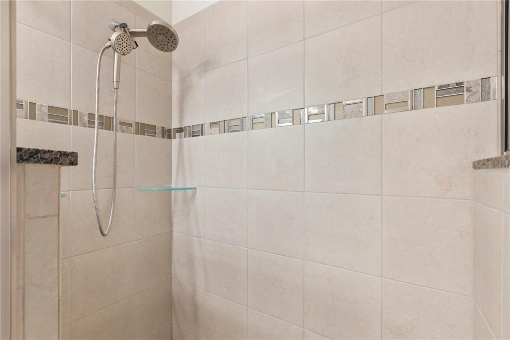 10 Rale Place Palm Coast, FL 32164 - Photo 17 of 27 a bathroom with a shower