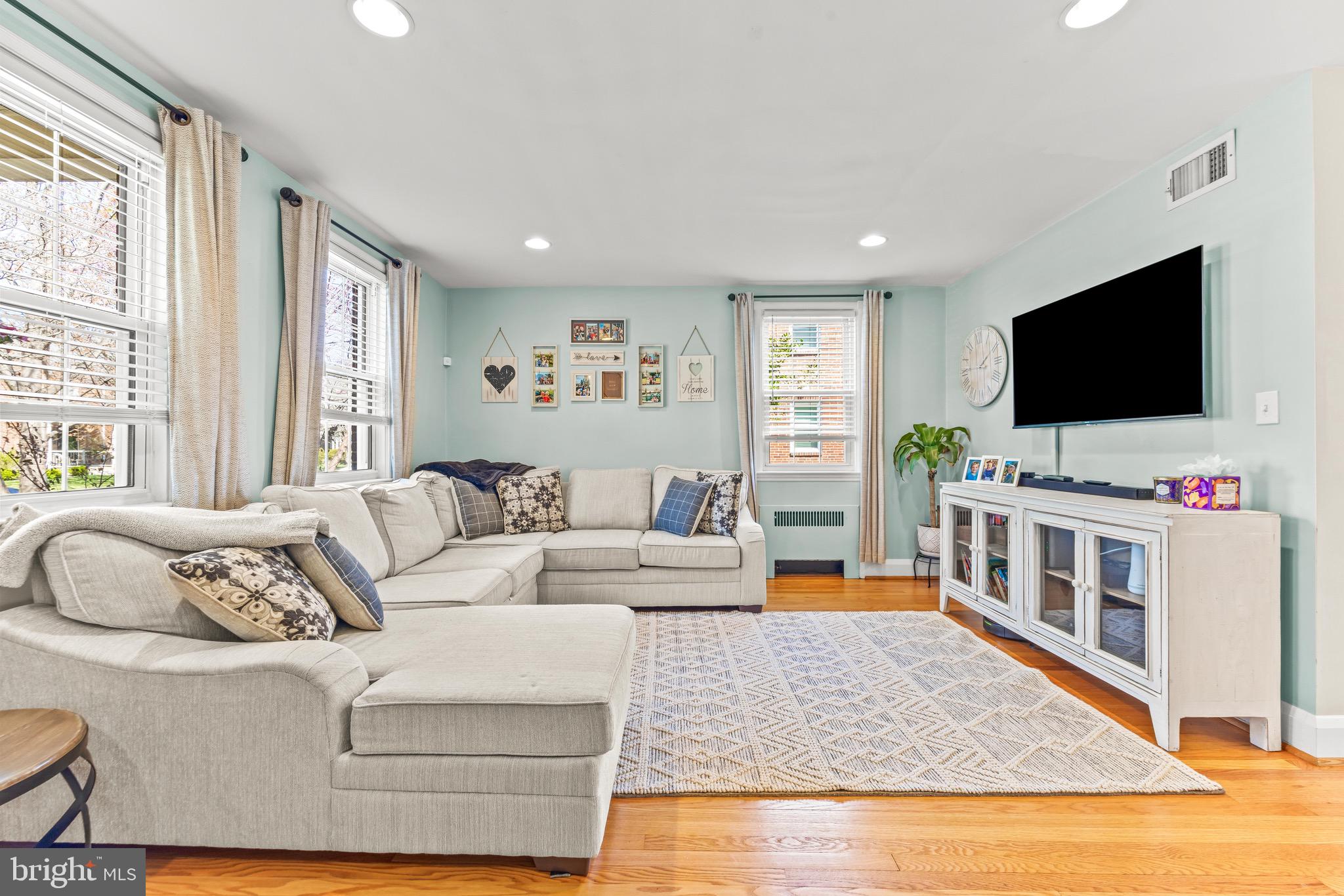 43 Murdock Road Baltimore, MD 21212 - Photo 5 of 42 a living room with furniture and a flat screen tv