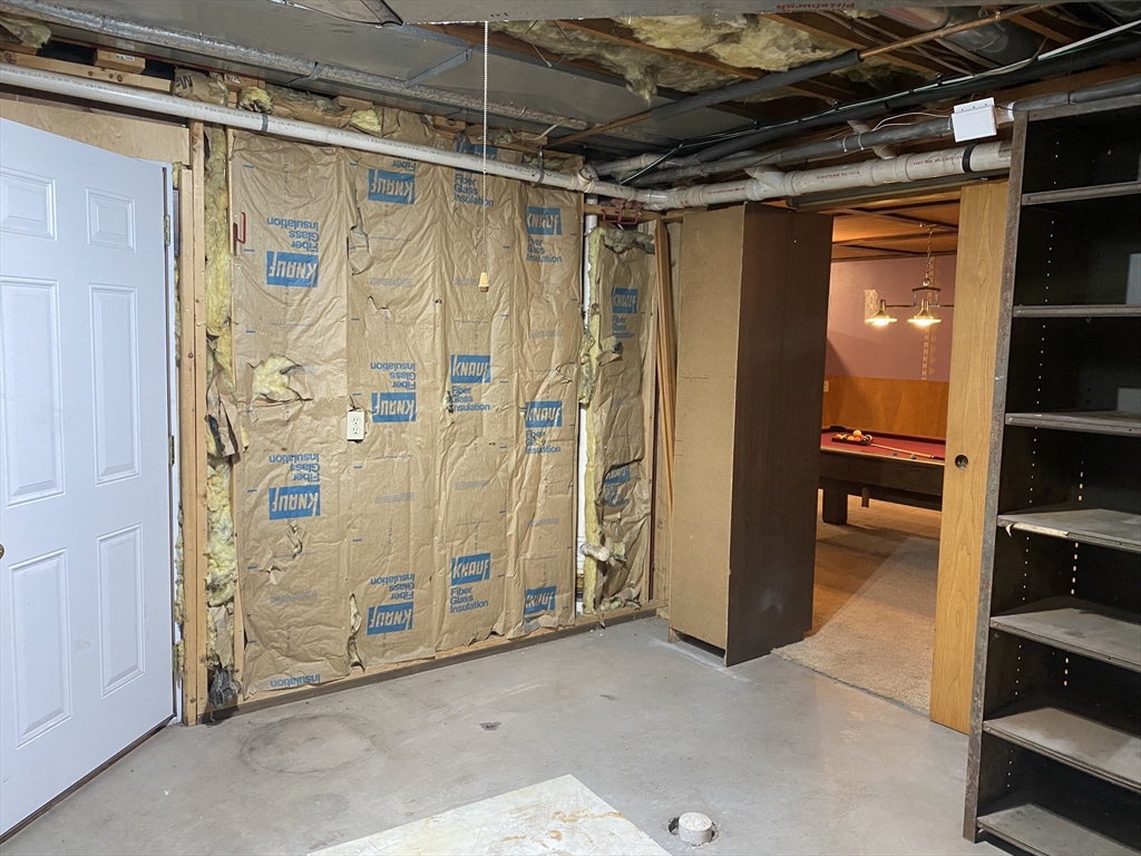 170 Bridge Street Warren, MA 01083 - Photo 33 of 34 a view of walk in closet with clothes and shoes