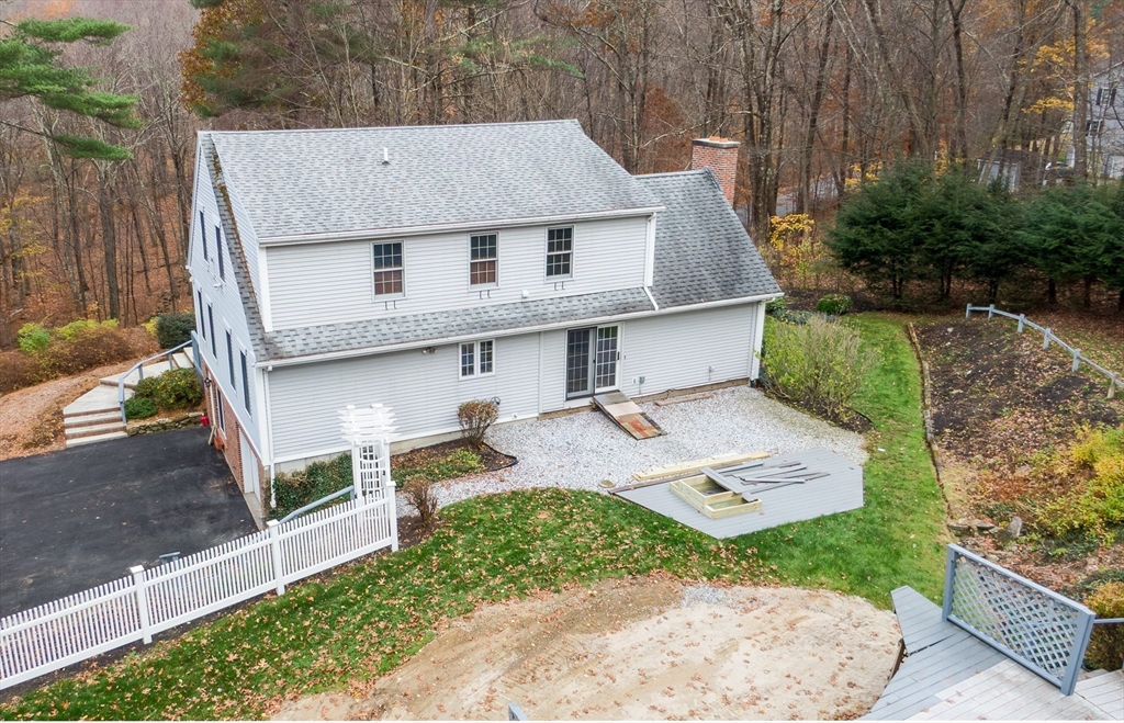 170 Bridge Street Warren, MA 01083 - Photo 4 of 34 a aerial view of a house with table and chairs in it