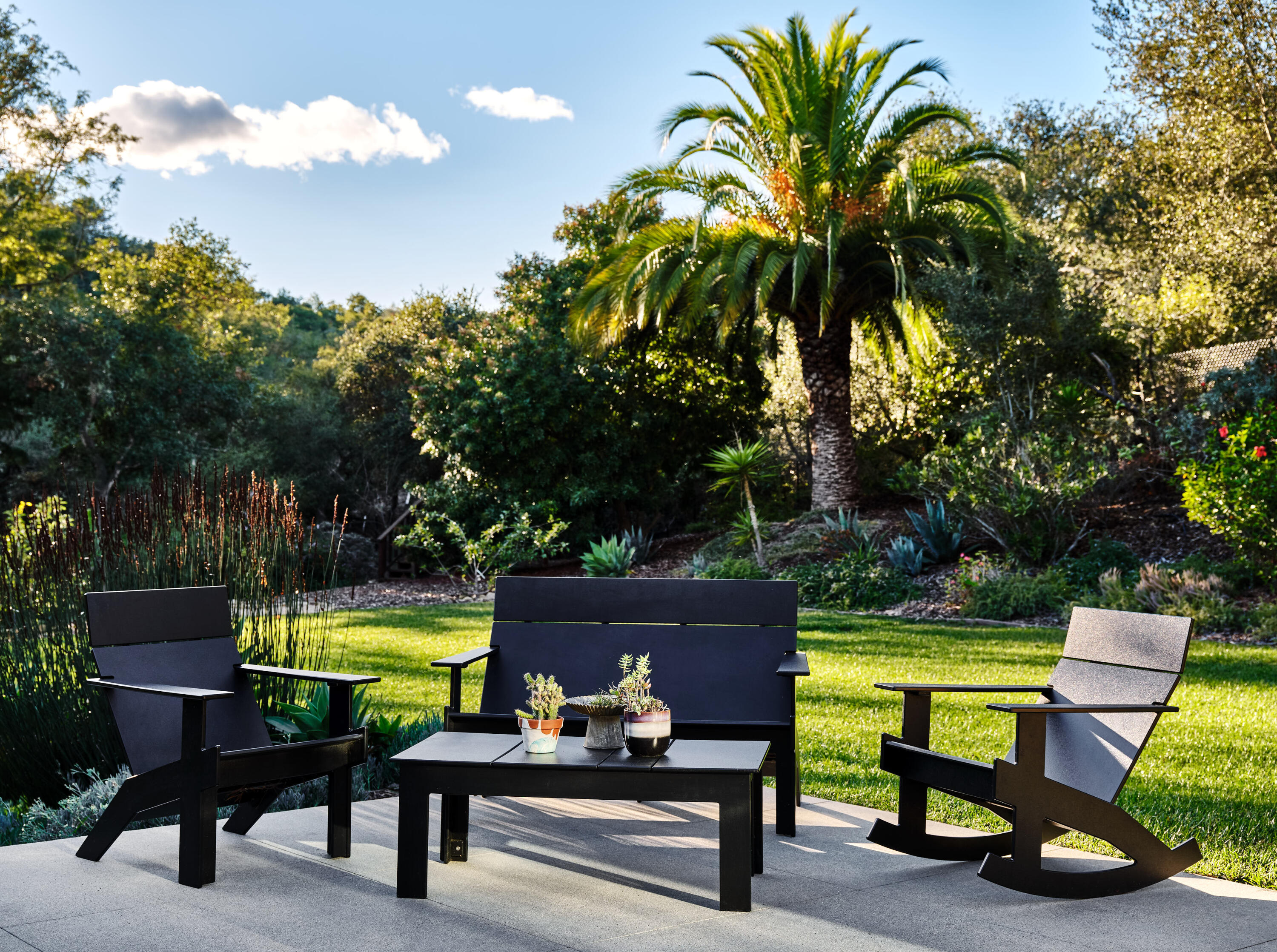 925 El Rancho Road Montecito, CA 93108 - Photo 19 of 28 a living room with furniture and a garden
