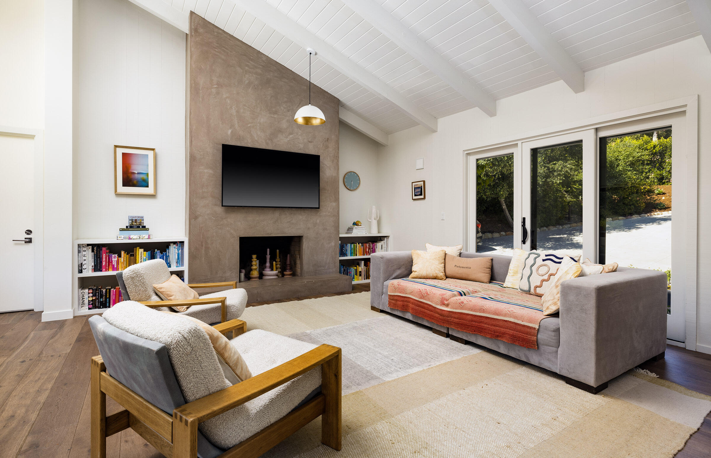 925 El Rancho Road Montecito, CA 93108 - Photo 4 of 28 a living room with furniture a flat screen tv and a fireplace