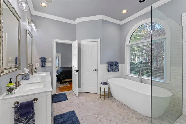 a utility room with sink dryer and washer