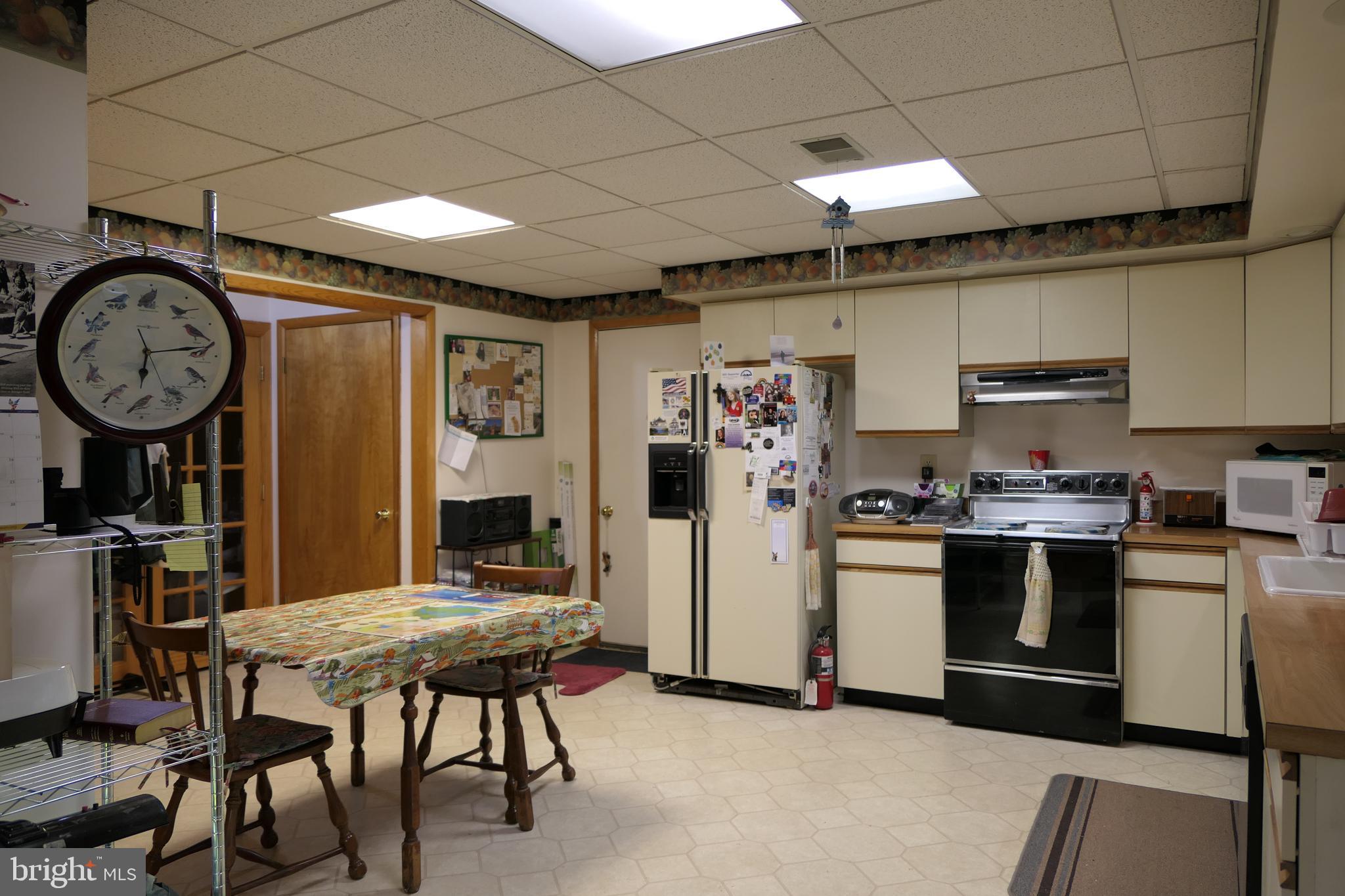 15423 Dover Road Upperco, MD 21155 - Photo 34 of 50 Lower Level Kitchen w/Door to Garage