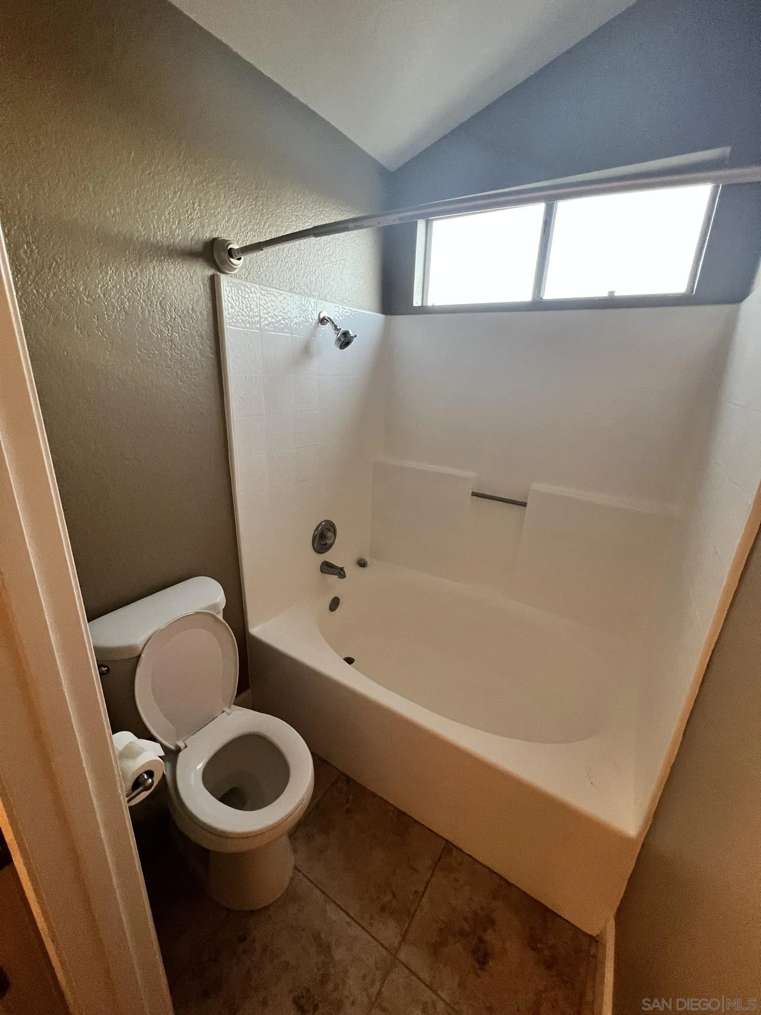 1565 Bay Meadows Drive Alpine, CA 91901 - Photo 15 of 23 a bathroom with a toilet a sink and bathtub