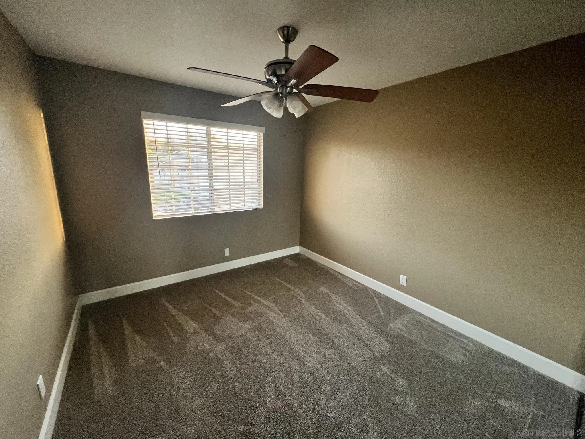 1565 Bay Meadows Drive Alpine, CA 91901 - Photo 18 of 23 a view of an empty room and a window