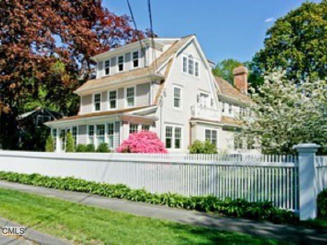 49 Judson Road Fairfield, CT 06824 - Photo 1 of 1 a front view of a house with a yard