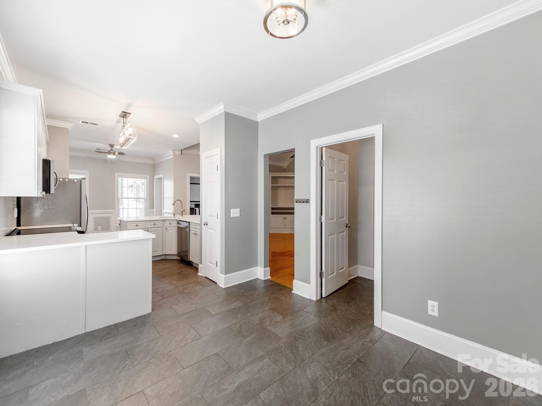 783 Sloan Street Denver, NC 28037 - Photo 16 of 44 a view of a kitchen and a kitchen