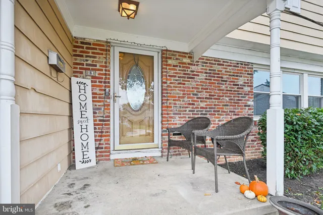 an outdoor view of house with outdoor seating