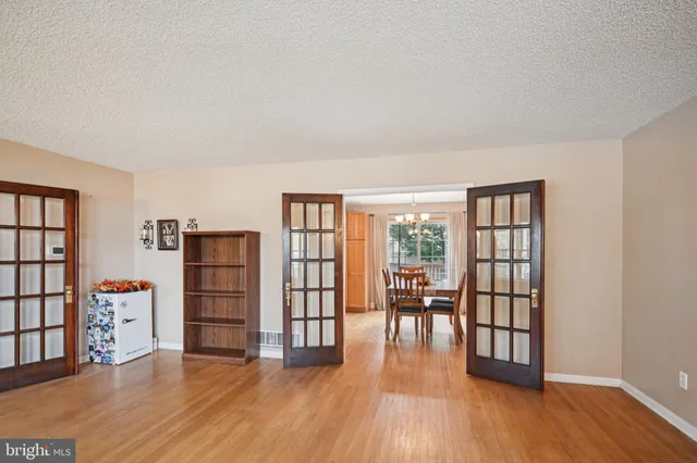 a view of a livingroom with furniture and wooden floor