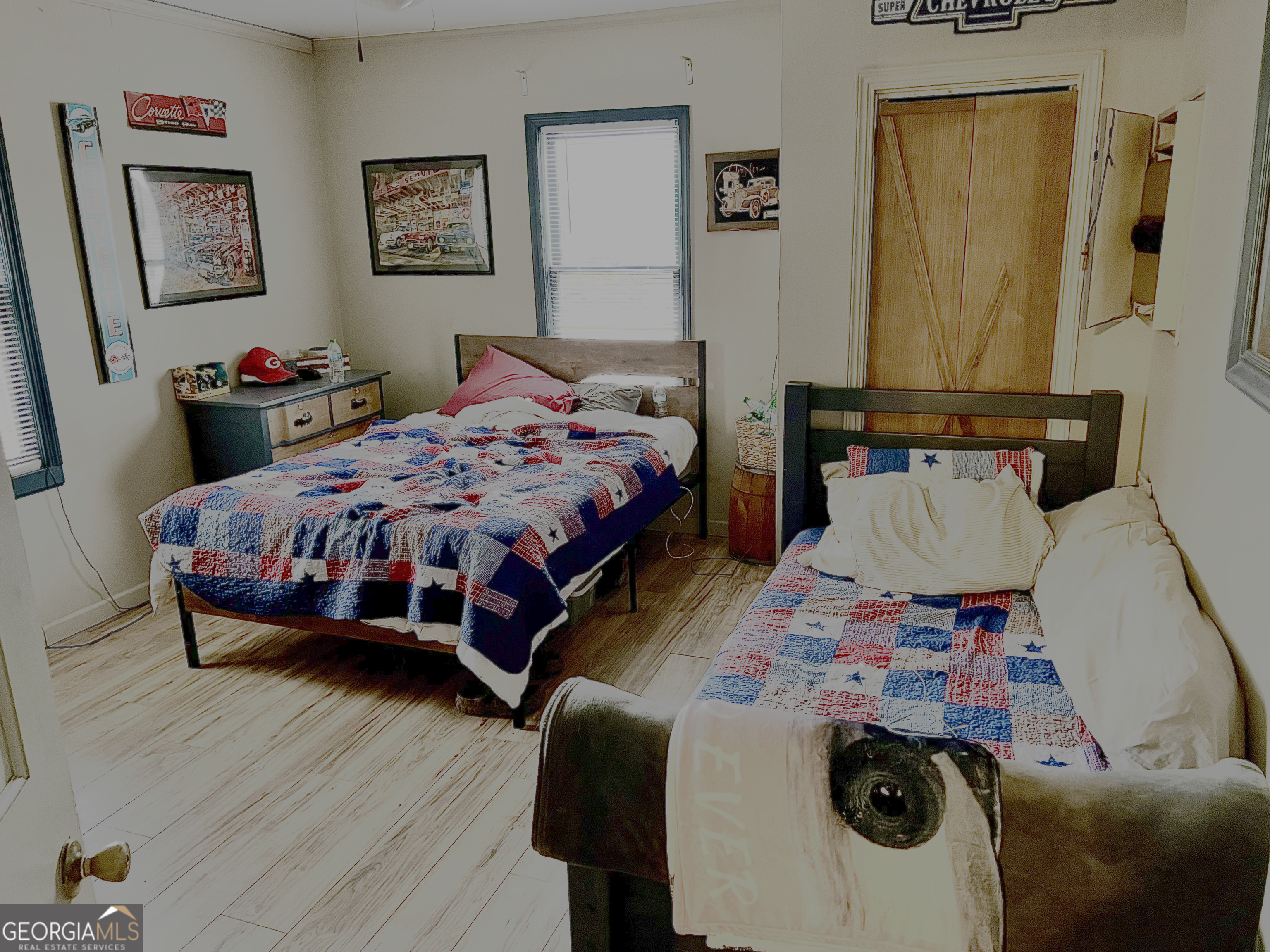 3402 B C Grant Road Cornelia, GA 30531 - Photo 11 of 12 a bedroom with two beds and a chair