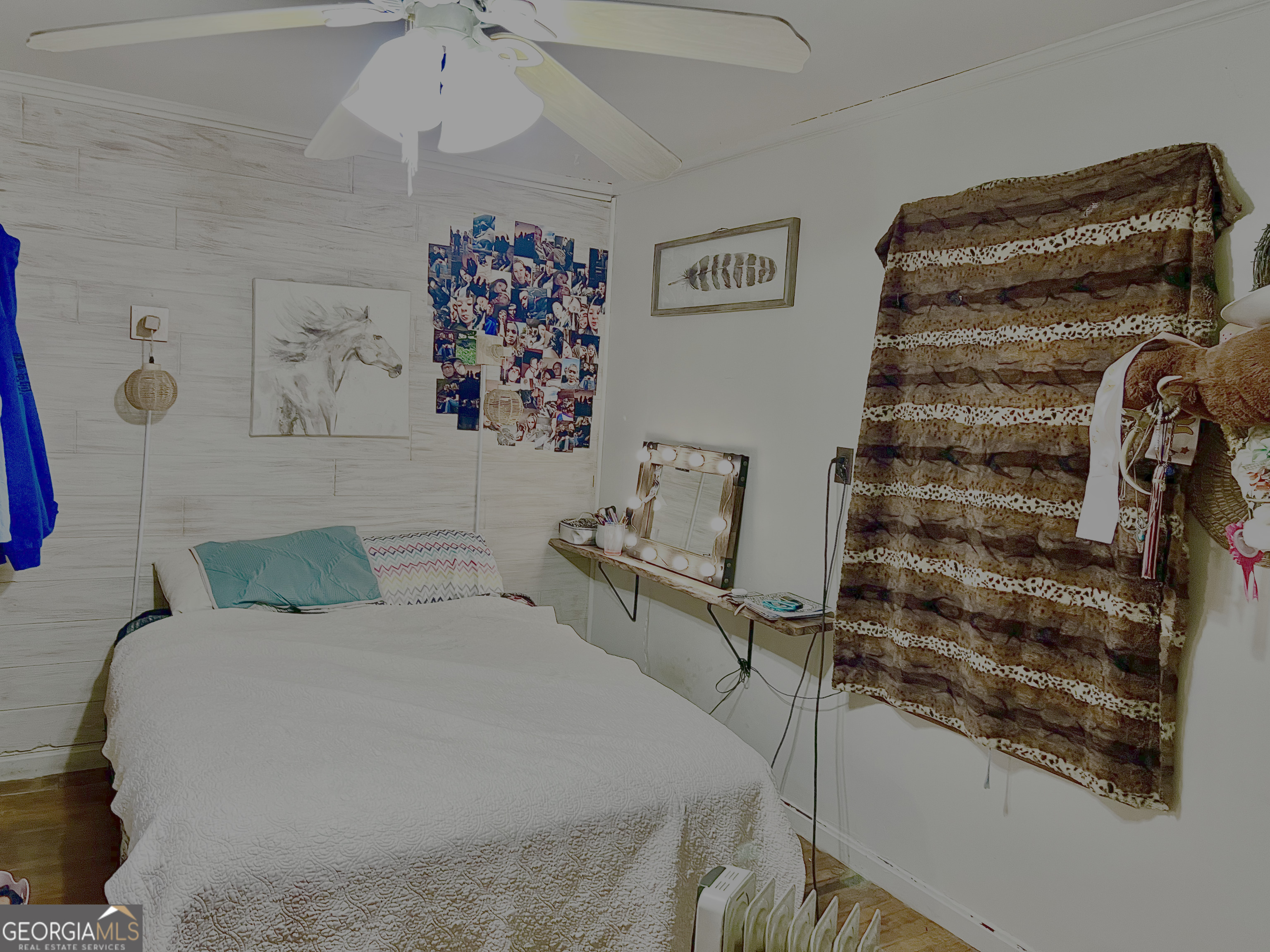 3402 B C Grant Road Cornelia, GA 30531 - Photo 10 of 12 a bedroom with a bed and a painting on the wall