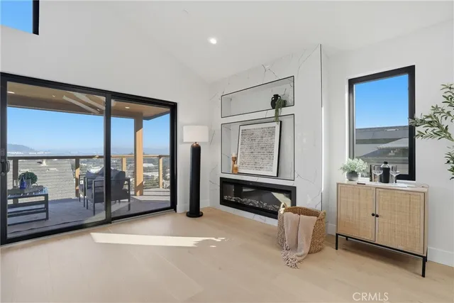 a terrace with outdoor seating and city view