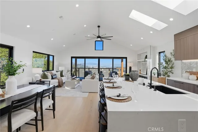 a spacious bedroom with a bed and window