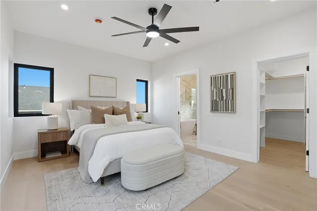 a kitchen with stainless steel appliances kitchen island granite countertop a stove a sink and a microwave