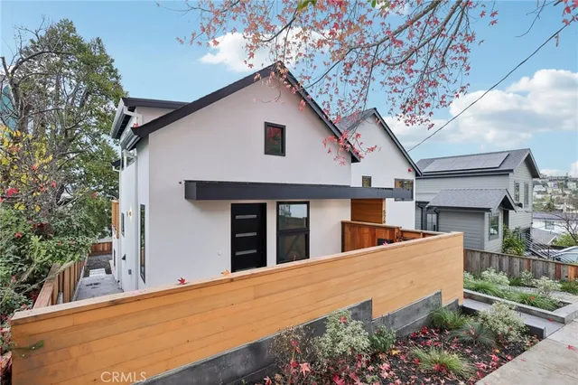 a view of a house with a backyard and windows