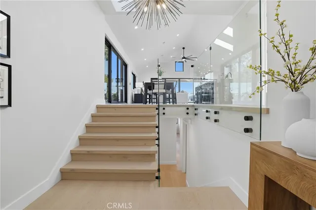 a kitchen with a table and chairs in it