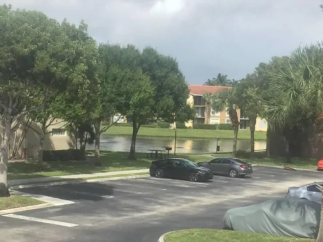 a view of a house with a big yard