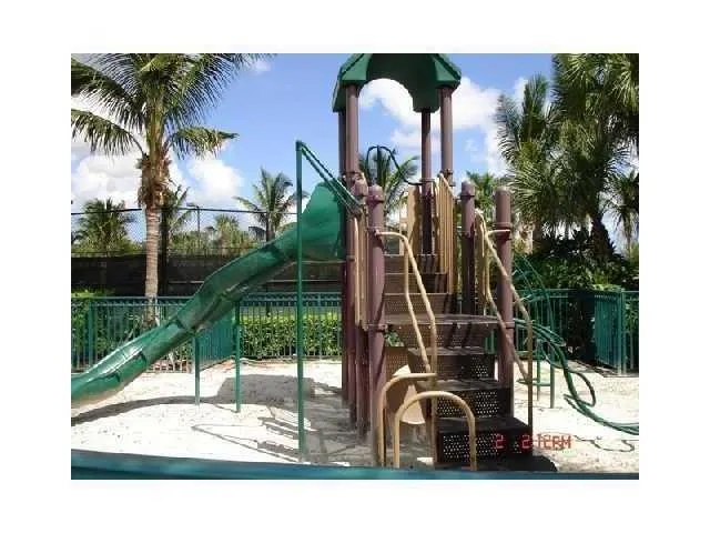 a view of a yard with a fountain