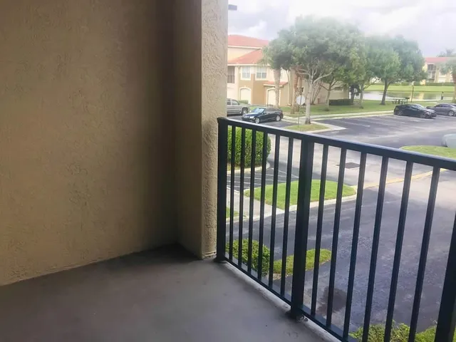 a view of a street from a balcony