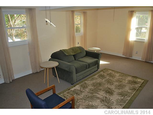 6137 Trotters Ridge Road Charlotte, NC 28227 - Photo 7 of 11 a living room with furniture and a window