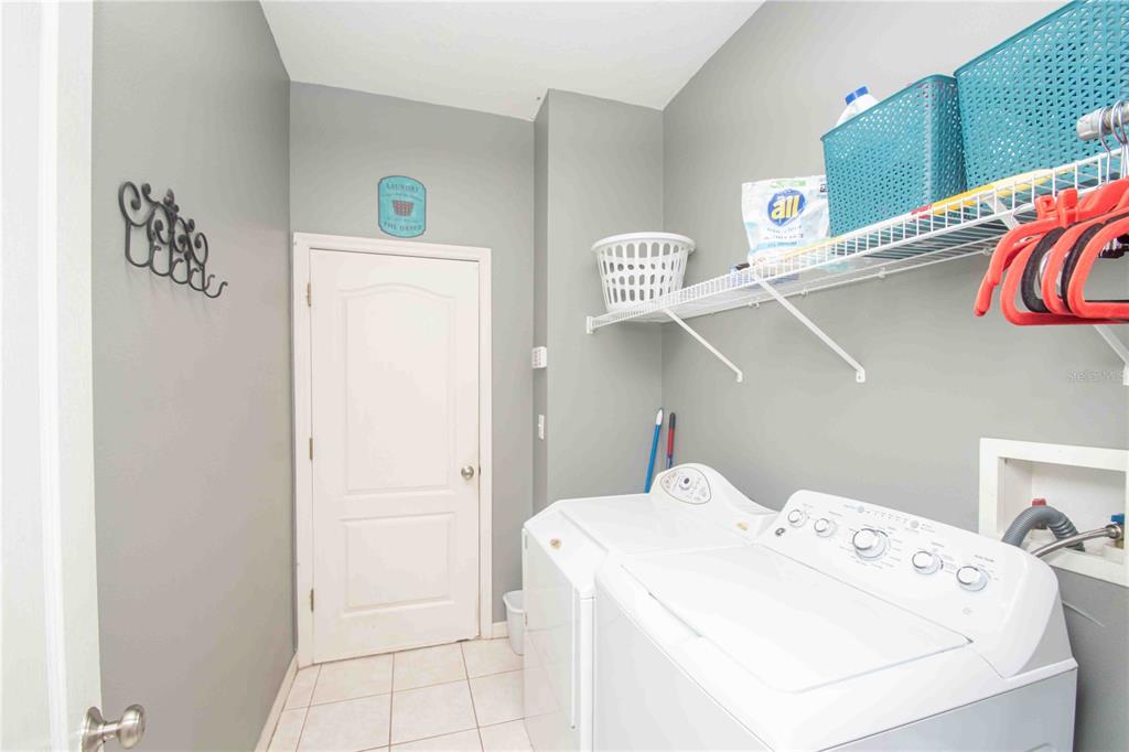 269 Fairmont Drive Spring Hill, FL 34609 - Photo 16 of 32 a utility room with dryer and washer