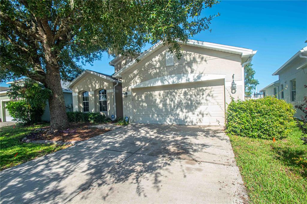269 Fairmont Drive Spring Hill, FL 34609 - Photo 24 of 32 a view of a house with a yard