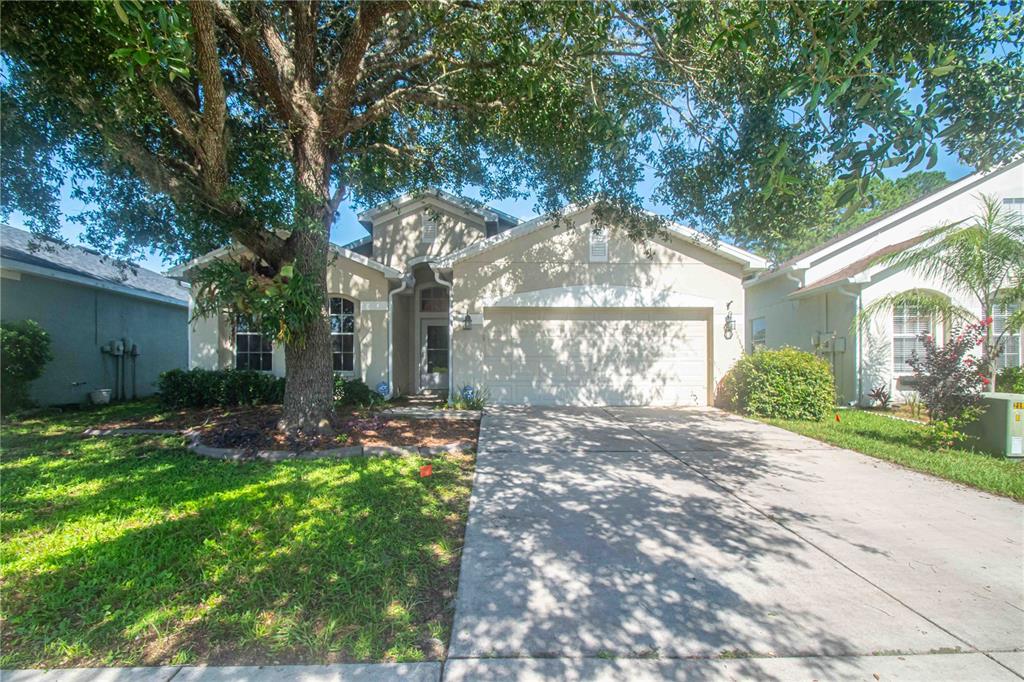 269 Fairmont Drive Spring Hill, FL 34609 - Photo 32 of 32 a view of a house with a yard
