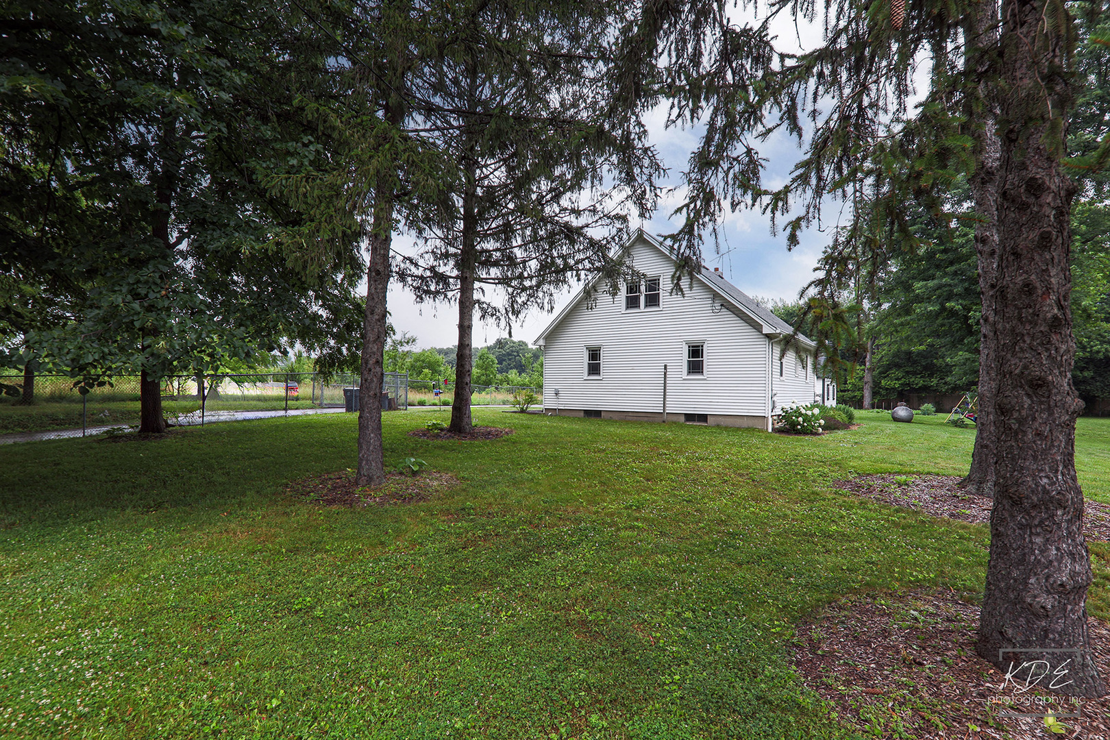 2S011 Nelson Lake Road Batavia, IL 60510 - Photo 19 of 26 a view of white house with a yard