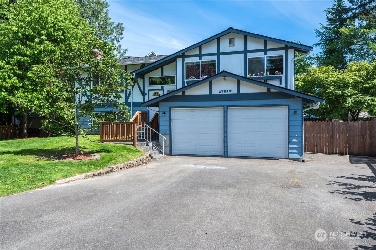 17917 30th Drive Southeast Bothell, WA 98012 - Photo 1 of 30 a front view of house with yard garage and green space