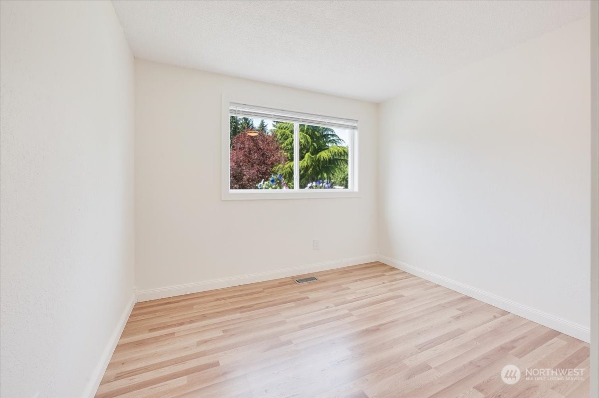 17917 30th Drive Southeast Bothell, WA 98012 - Photo 15 of 30 an empty room with a window