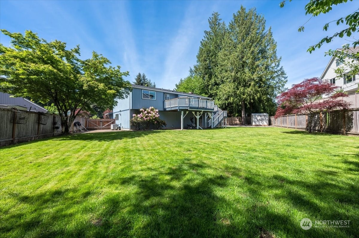17917 30th Drive Southeast Bothell, WA 98012 - Photo 26 of 30 a front view of house with a garden