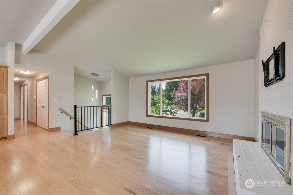 17917 30th Drive Southeast Bothell, WA 98012 - Photo 4 of 30 a view of livingroom with furniture and wooden floor